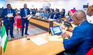 Mr. Biodun Ogunleye  as Commissioner for Energy & Mineral Resources (left) and Mr. Olufemi Daramola as Special Adviser on Infrastructure (second left) being administered Oath, presided by Governor of Lagos State, Mr. Babajide Sanwo-Olu (right), with him, Deputy Governor, Dr. Obafemi Hamzat (second right); Secretary to the State Government, Barr. Abimbola Salu-Hundeyin (third right) and other cabinet members, during the swearing in of the two new cabinet members at the EXCO chambers, Lagos House, Ikeja, on Wednesday, 06 December 2023.